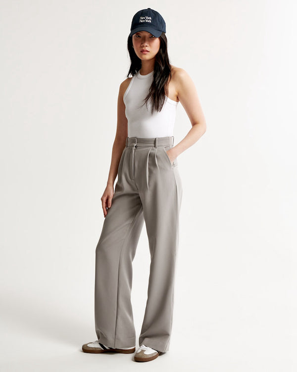 Pantalon taille haute à plis et coupe large
